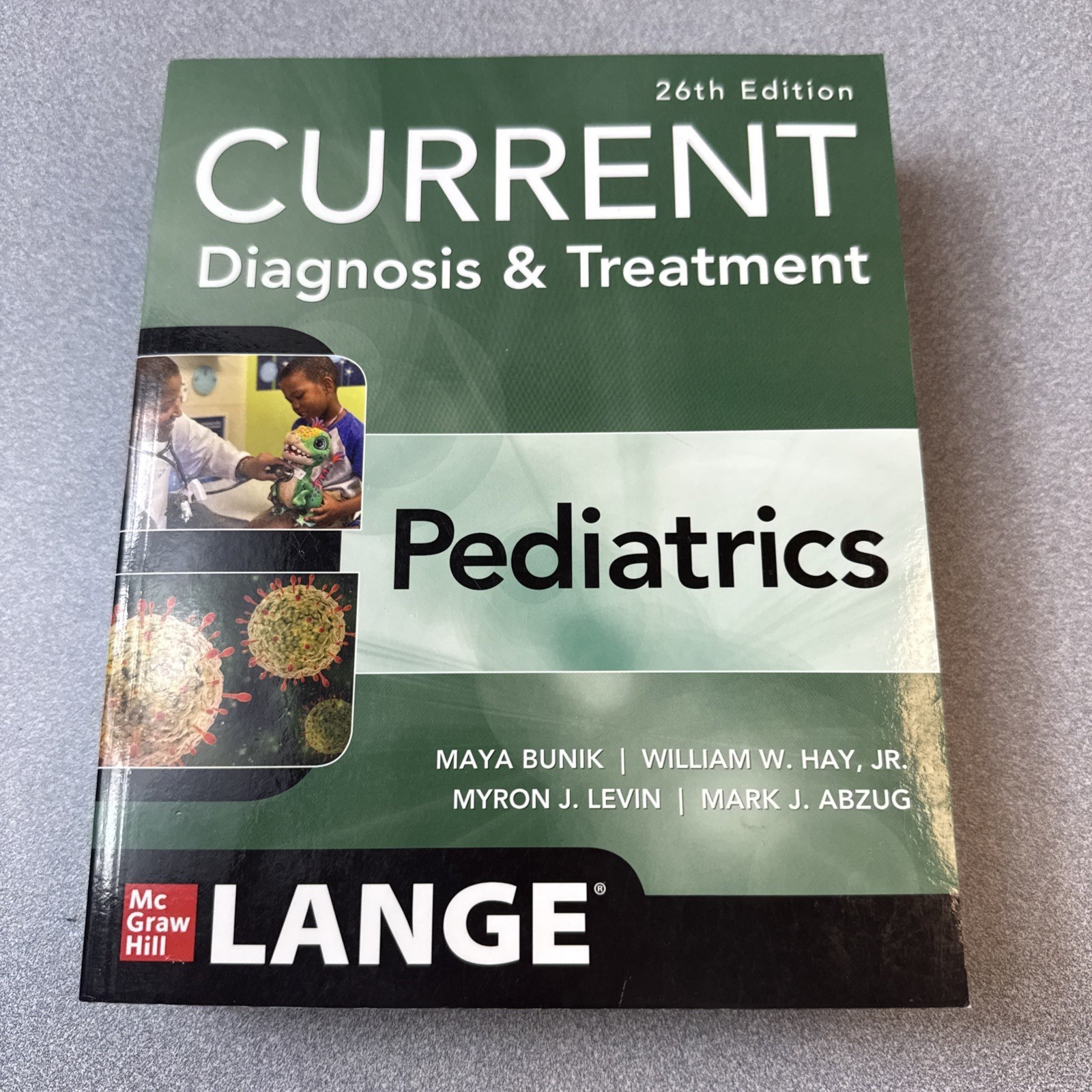 Current Diagnosis & Treatment Pediatrics, 26th Edition Paperback Good