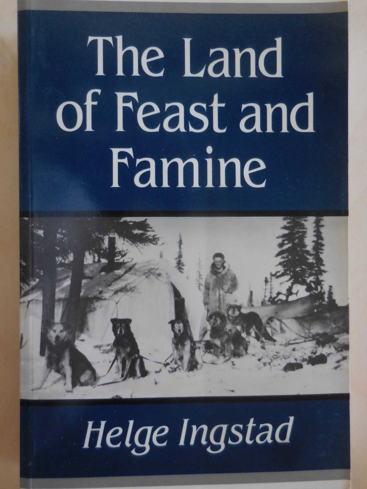 Soft bound book “The land of Feast and Famine” VG+
