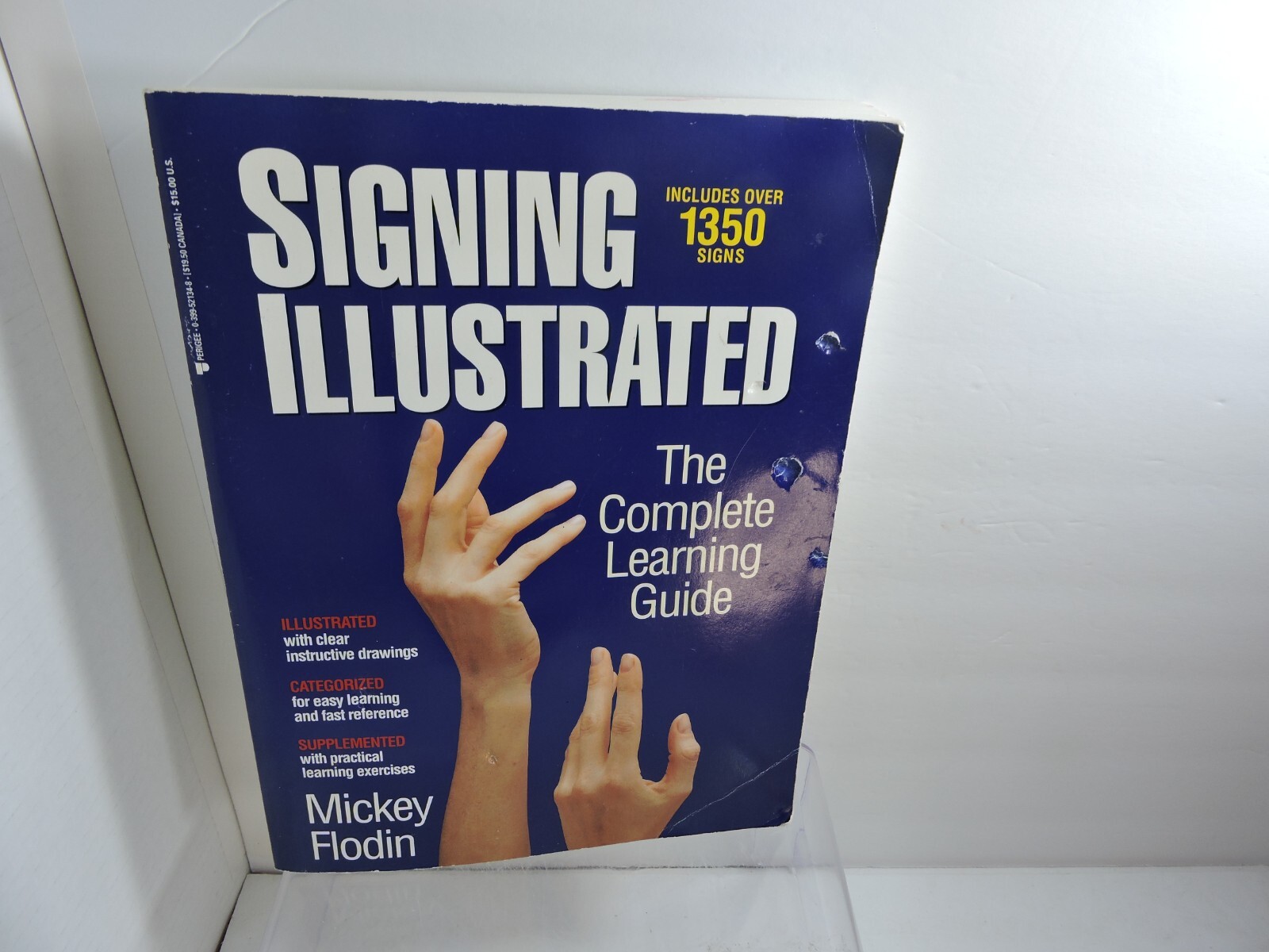 Signing Illustrated includes over 1350 signs by mickey Flodin