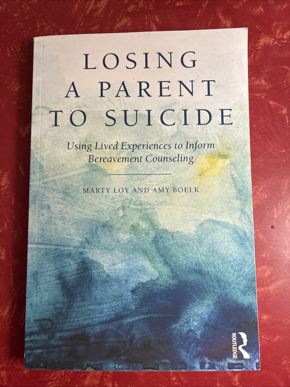 Losing a Parent to Suicide : Using Lived Experiences for Bereavement Counseling
