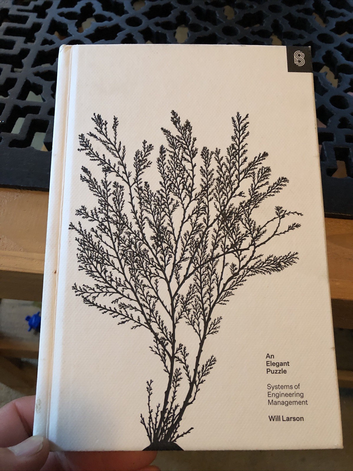 An Elegant Puzzle: Systems of Engineering Management by
